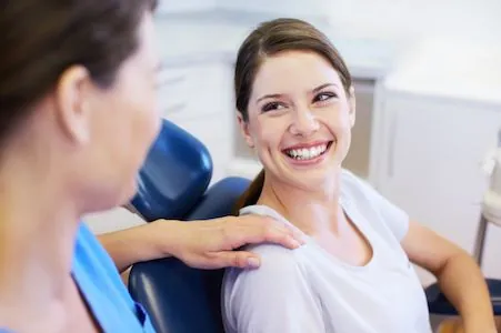 patient smiling after receiving dental crowns in Beverly Hills, CA